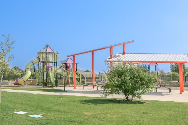 view of playground featuring a lawn