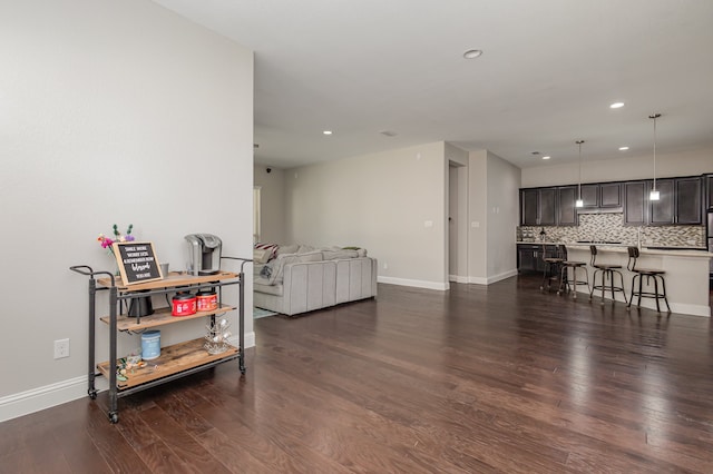 living room featuring dark hardwood / wood-style flooring