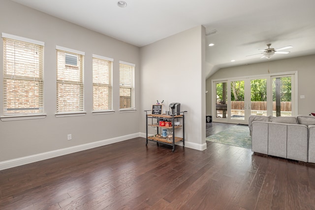 living room featuring french doors, dark hardwood / wood-style floors, and ceiling fan