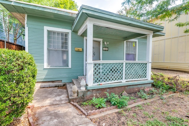 property entrance with a porch