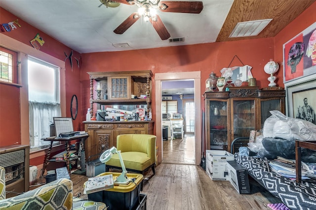 misc room featuring ceiling fan and hardwood / wood-style flooring