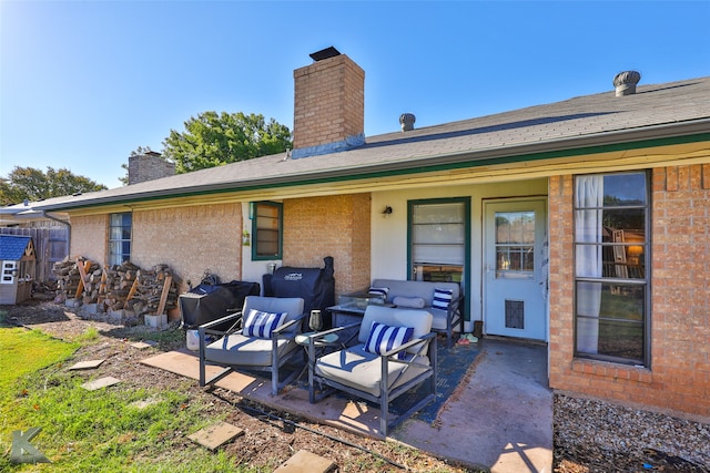 back of house featuring a patio