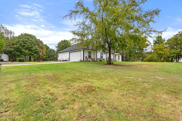 view of yard with a garage