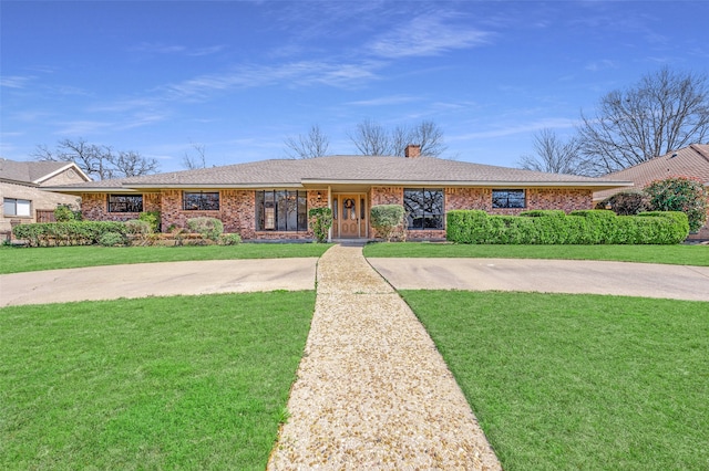 ranch-style home with a front yard