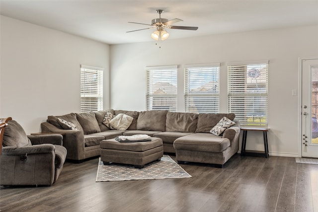 living room with ceiling fan, dark hardwood / wood-style floors, and a healthy amount of sunlight