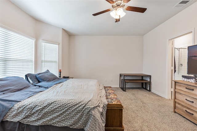 bedroom featuring light carpet and ceiling fan