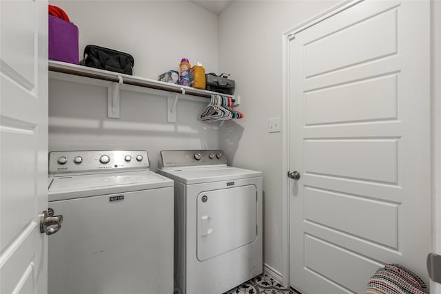 laundry room featuring separate washer and dryer