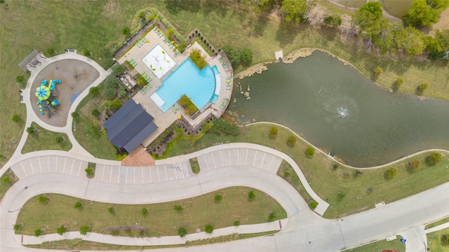 birds eye view of property featuring a water view