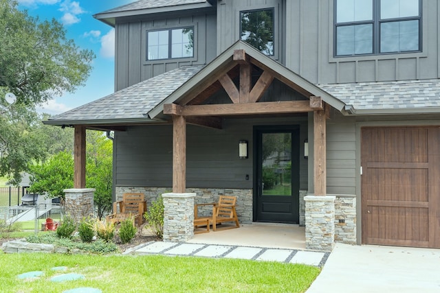 doorway to property with a garage