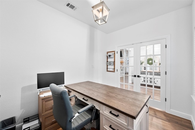 office space featuring dark wood-type flooring and french doors