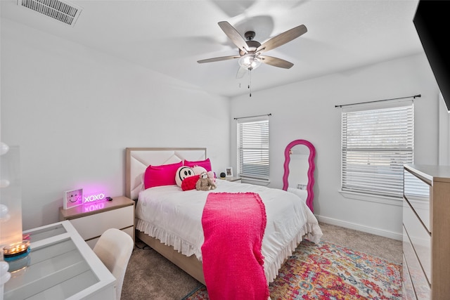 bedroom with ceiling fan and carpet flooring