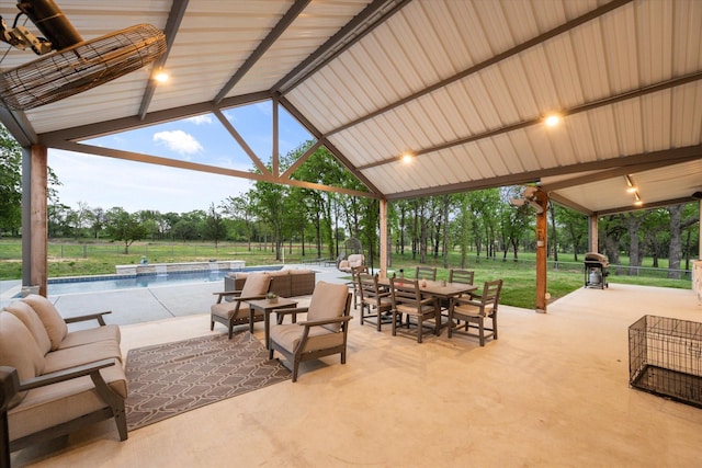 view of patio / terrace featuring grilling area, a gazebo, an outdoor living space, and pool water feature