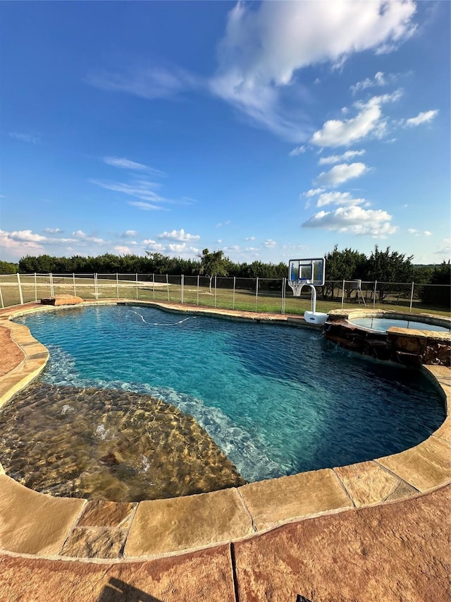 view of pool featuring a water slide