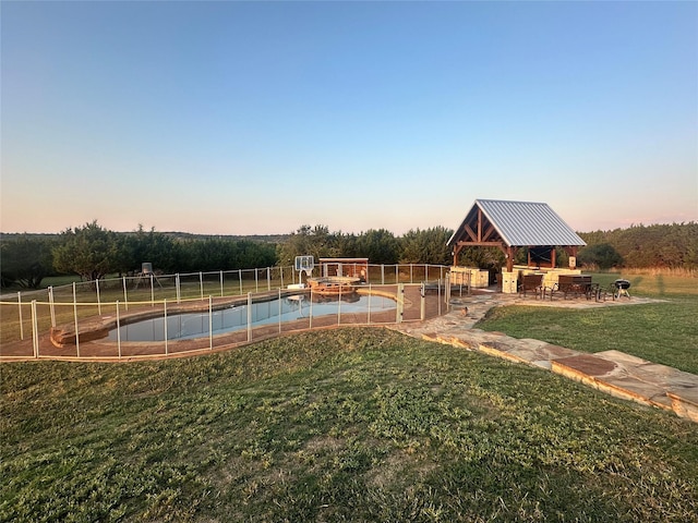 exterior space with a gazebo and a yard