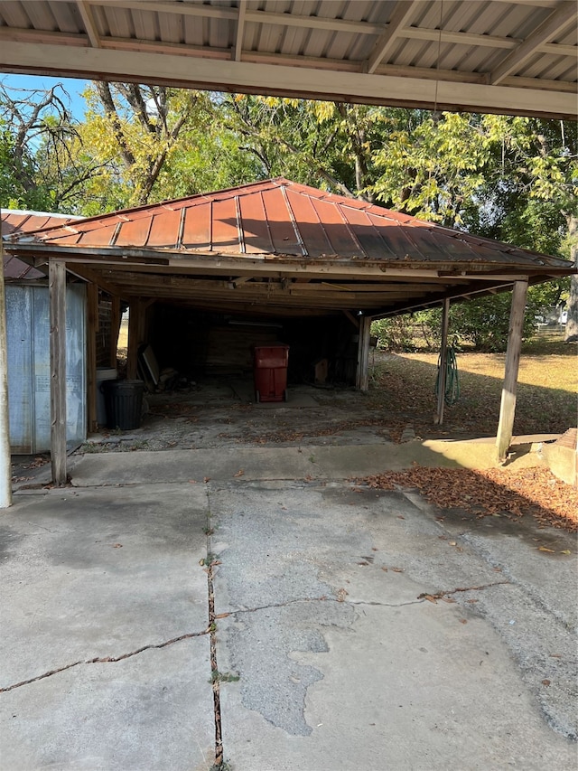 view of parking / parking lot with a carport