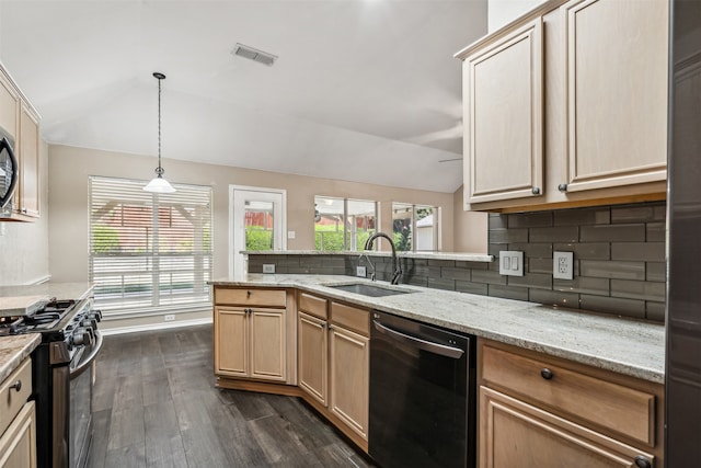 kitchen with lofted ceiling, black dishwasher, dark hardwood / wood-style flooring, stainless steel range with gas cooktop, and sink