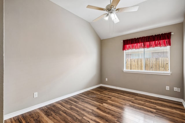 unfurnished room featuring lofted ceiling, ceiling fan, and dark hardwood / wood-style flooring