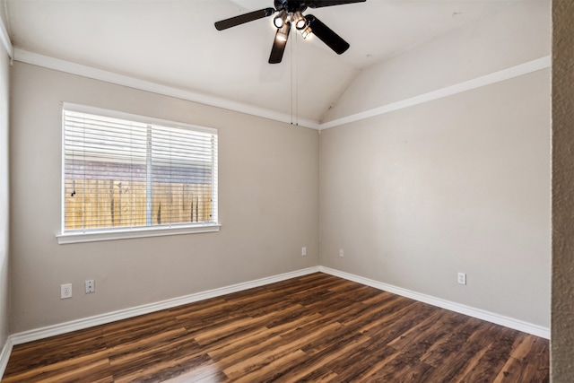 empty room featuring dark hardwood / wood-style flooring and plenty of natural light