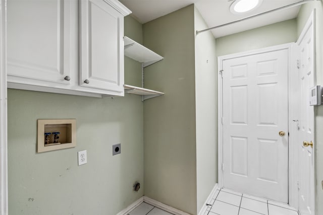 laundry room featuring light tile patterned floors, washer hookup, hookup for an electric dryer, and cabinets