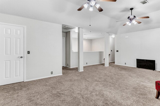 unfurnished living room featuring light colored carpet and ceiling fan