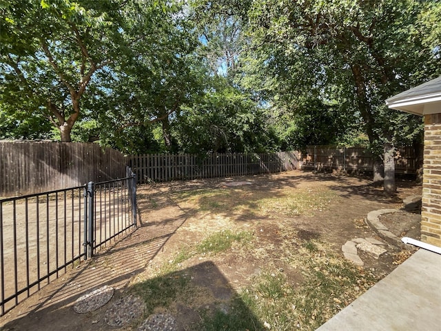 view of yard featuring a fenced backyard