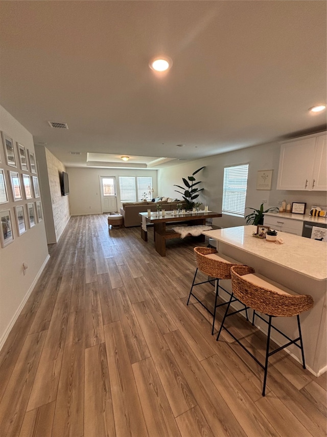 dining area with light hardwood / wood-style flooring