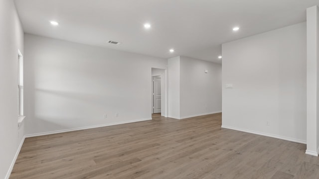 unfurnished room featuring light wood-type flooring