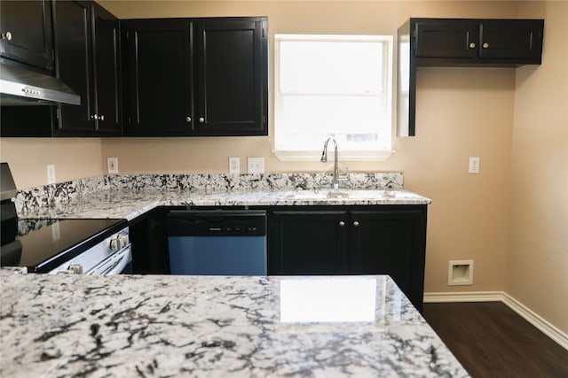 kitchen featuring light stone counters, stainless steel appliances, dark hardwood / wood-style flooring, and sink