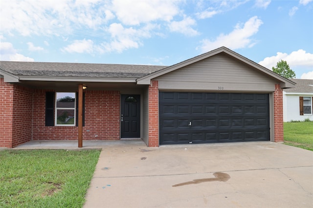 ranch-style home with a garage