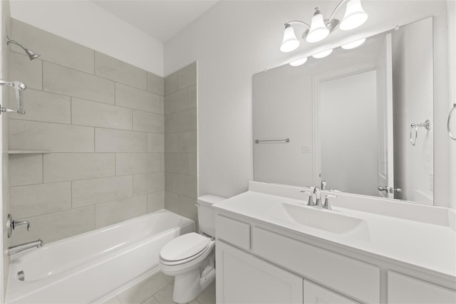 full bathroom with tile patterned flooring, tiled shower / bath combo, toilet, and vanity