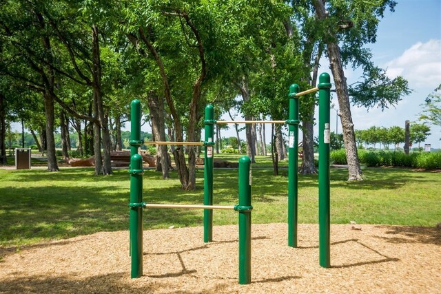 view of jungle gym with a lawn