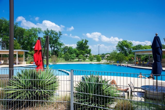 view of swimming pool featuring a patio