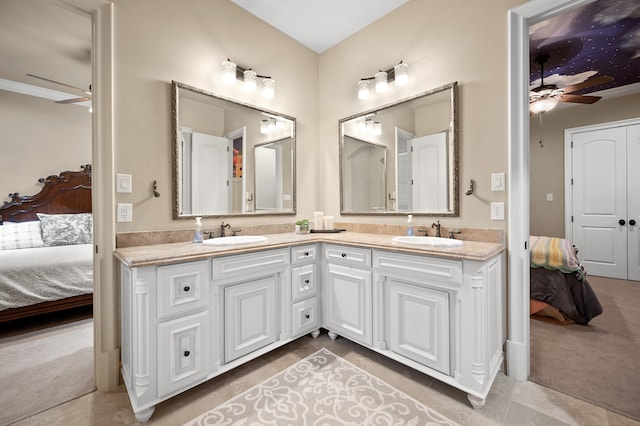 bathroom featuring vanity, ceiling fan, and ornamental molding