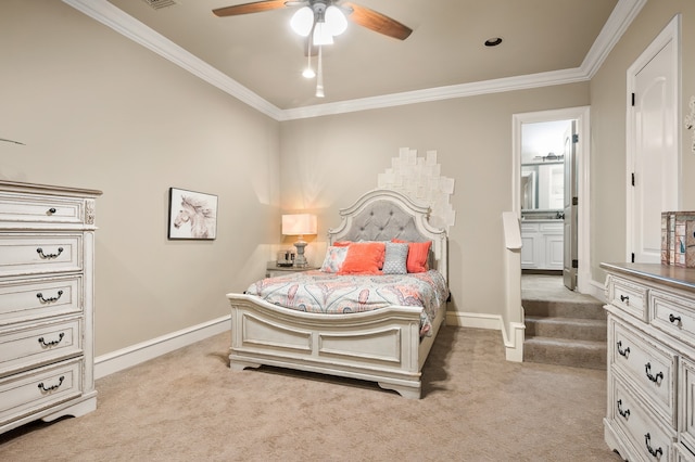 carpeted bedroom with ceiling fan, ornamental molding, and connected bathroom