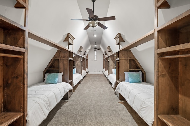 bedroom featuring lofted ceiling, ceiling fan, and carpet