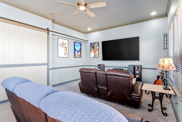 interior space featuring ornamental molding, ceiling fan, and carpet floors