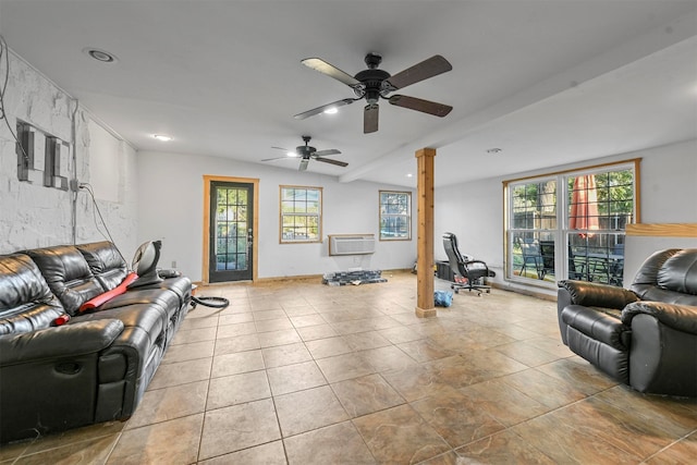 living room with ceiling fan, light tile patterned floors, decorative columns, and a wall mounted AC