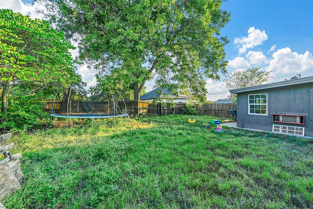 view of yard featuring a trampoline