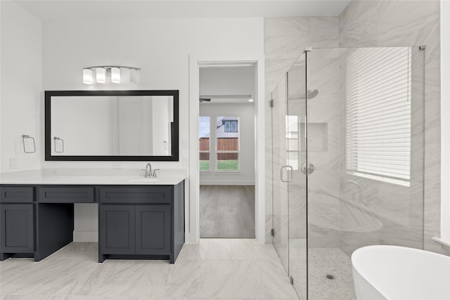 bathroom with vanity, independent shower and bath, and wood-type flooring