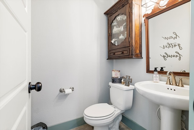 bathroom featuring toilet