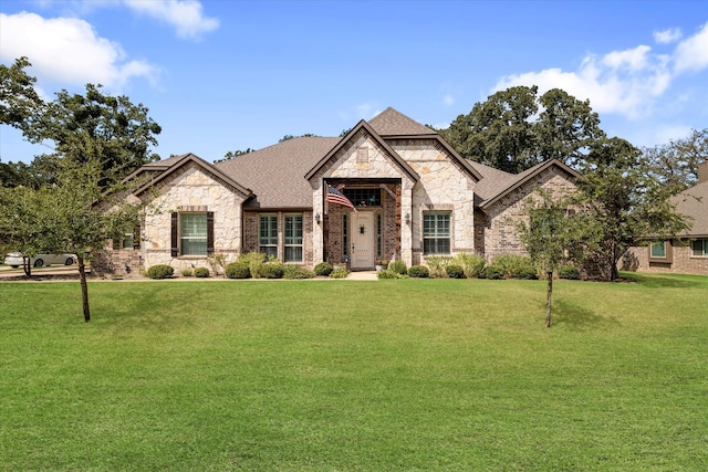 view of front of property with a front lawn