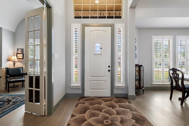 foyer entrance featuring hardwood / wood-style floors