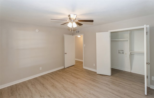 unfurnished bedroom featuring a closet, ceiling fan, and light hardwood / wood-style flooring