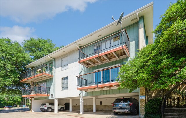 view of building exterior featuring a carport