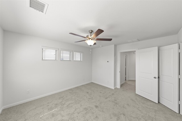 interior space featuring ceiling fan