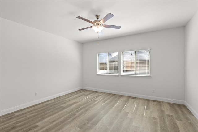 unfurnished room featuring light hardwood / wood-style flooring and ceiling fan