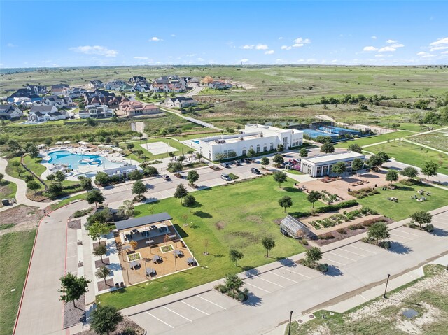 birds eye view of property with a residential view