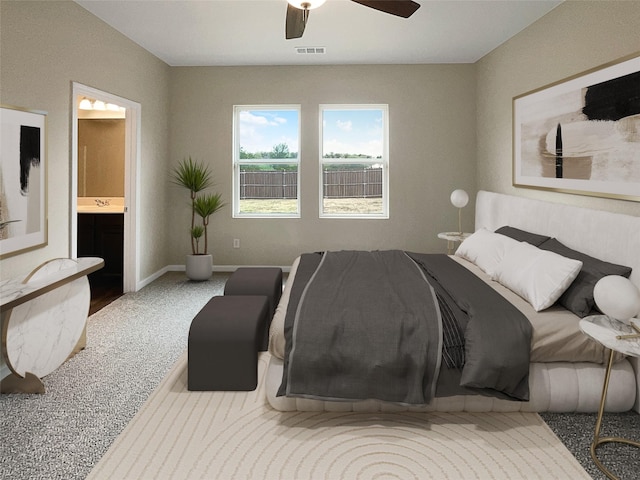 carpeted bedroom featuring a ceiling fan, visible vents, connected bathroom, and baseboards