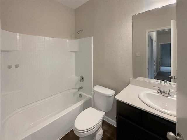 full bathroom featuring vanity, toilet, hardwood / wood-style floors, and shower / tub combination