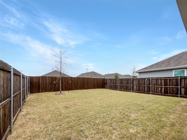 view of yard featuring a fenced backyard